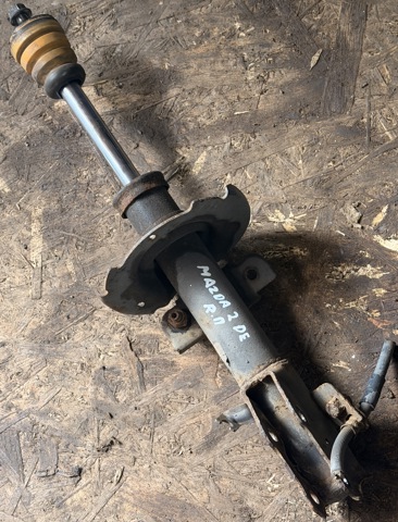 Стойка передняя правая DF7134700G MAZDA