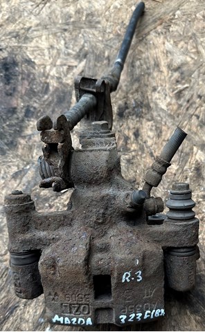 Задний правый суппорт Мазда 626 V