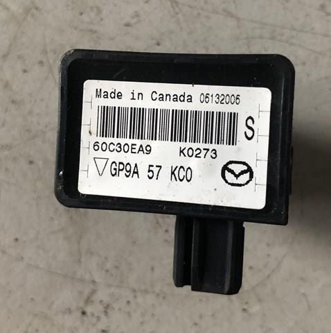 Датчик AIRBAG передний GP9A57KC0 MAZDA