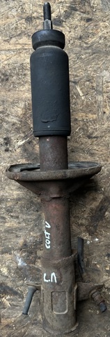 Амортизаторная стойка передняя левая Митсубиси Лансер VI