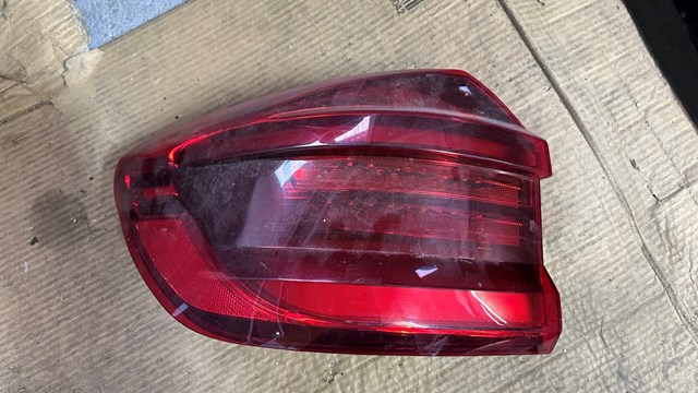 Фонарь задний левый, внешний 63217408737 BMW
