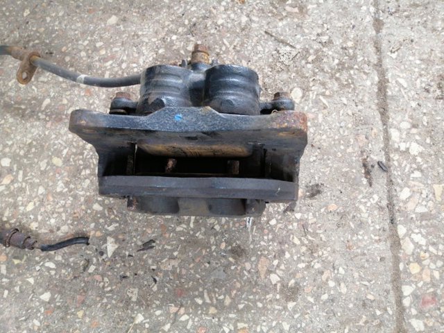 Суппорт тормозной, передний, правый 26292AE06B SUBARU