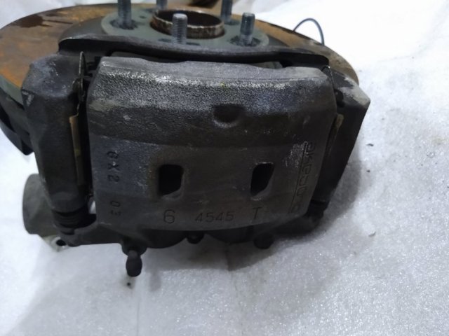 NISSAN 410114GS0A Суппорт тормозной передний левый в наличии Винница