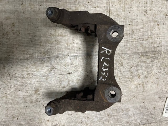 Скоба тормозного заднего суппорта LR036572 LAND ROVER