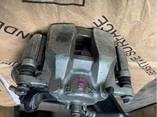 Суппорт тормозной, передний, левый 45019T3Z000 HONDA
