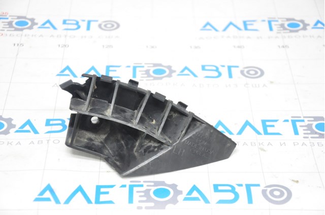 6005888 Tesla кронштейн бампера переднего внешний левый