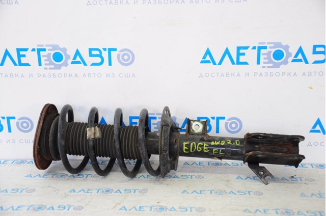 F2GZ18124E Ford амортизатор передний левый