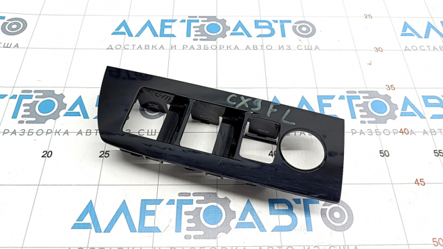Накладка управления стеклоподъемником передним левым mazda cx-9 16- черная, глянец, царапины, слом креп TK48684L6C