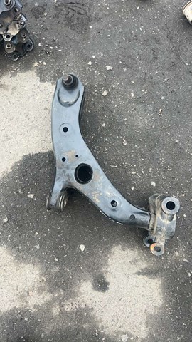 Передний нижний рычаг G46C34300J MAZDA