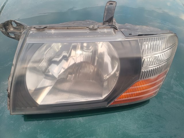 Основная фара в сборе левая MR388007 MITSUBISHI