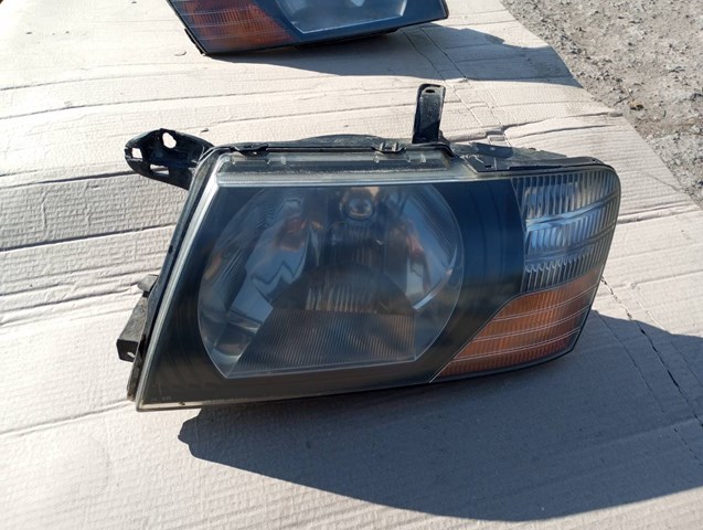 Фара левая передняя MR558823 MITSUBISHI