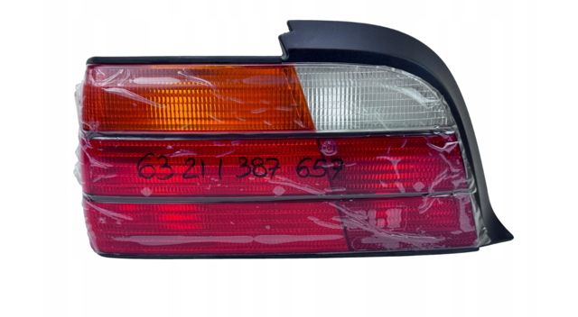 Фонарь задний левый 63211387657 BMW