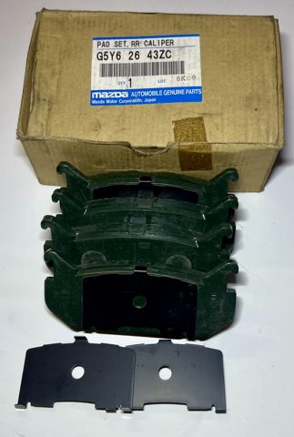Колодки тормозные дисковые комплект G5Y62643ZC MAZDA