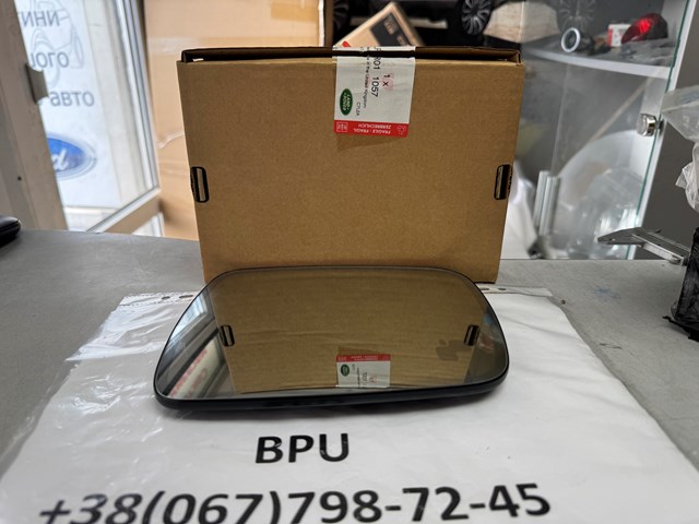 LR011057 LAND ROVER Стекло левого зеркала заднего вида купить в Одесса