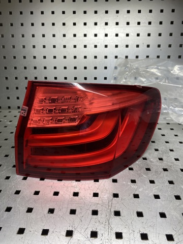 Фонарь задний левый, внешний 7203233 BMW