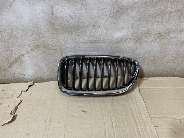 Решетка радиатора левая 7412323 BMW