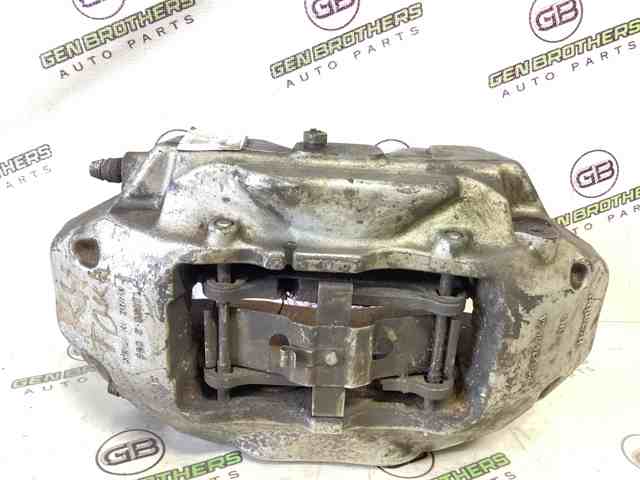 Суппорт тормозной передний правый 7L6615150A VAG