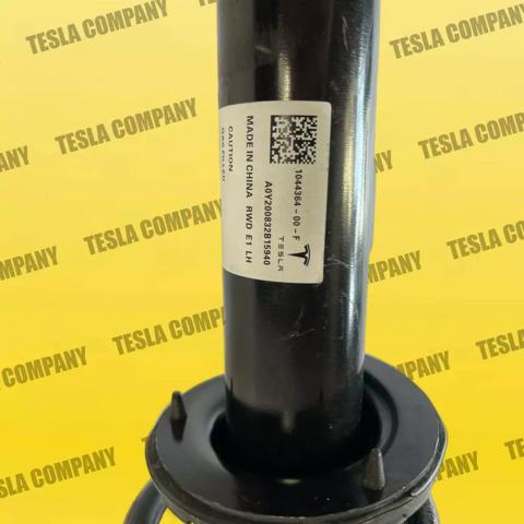 Амортизатор передний левый 104409200A Tesla