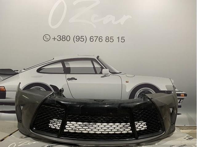 Передний бампер 5211906A50 Toyota