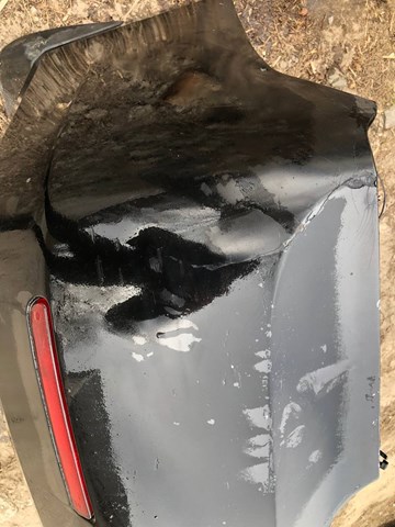 Задний бампер 1018005772 Geely