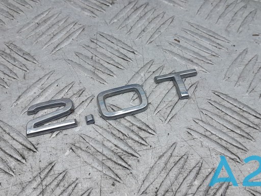 Эмблема крышки багажника (фирменный значок) на Audi A6 4G5
