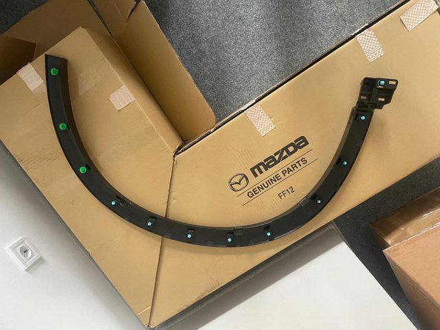 Купить KPF151W30 Mazda Накладка передней левой арки колеса