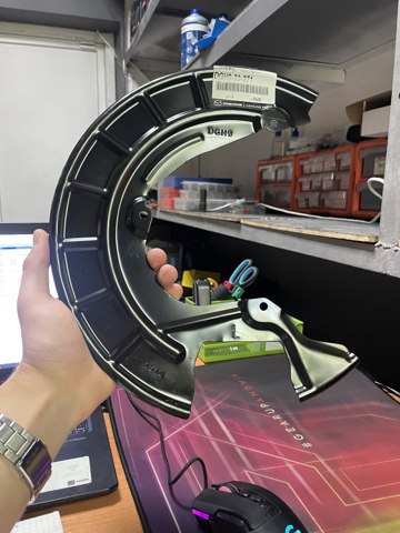 DGH933271 Mazda Пыльник тормозного диска переднего левого