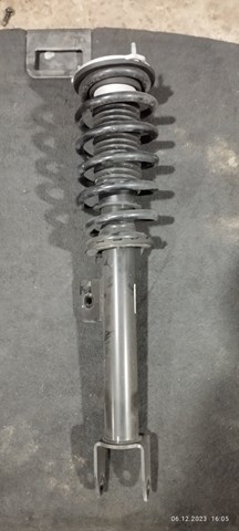 Стойка передняя левая Tesla 104436400G