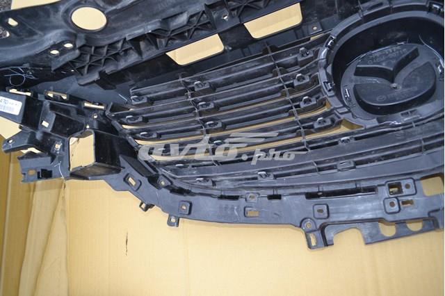 Купить G46M50716 Mazda Эмблема решетки радиатора