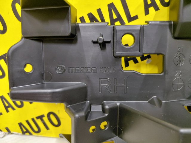 Купить GSH750103 Mazda Кронштейн бампера переднего правый