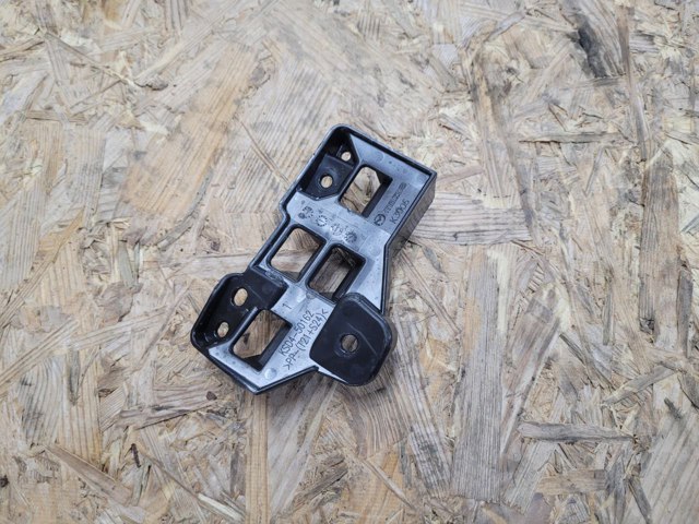 Купить KSD450162 Mazda Кронштейн решетки радиатора