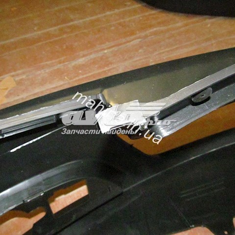 Передний бампер 101800611201 Geely