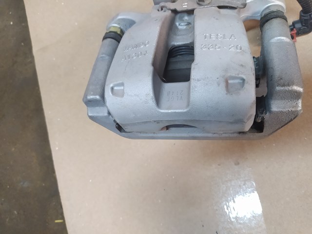 Суппорт задний правый TQ33087 Tqparts