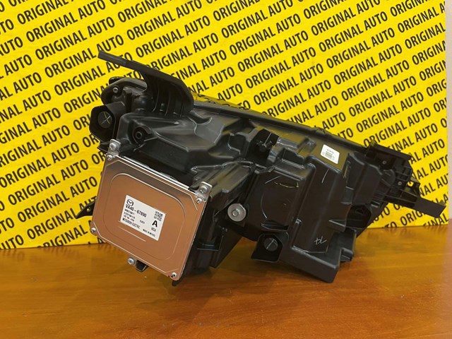 Купить VA4051040B Mazda Фара левая передняя