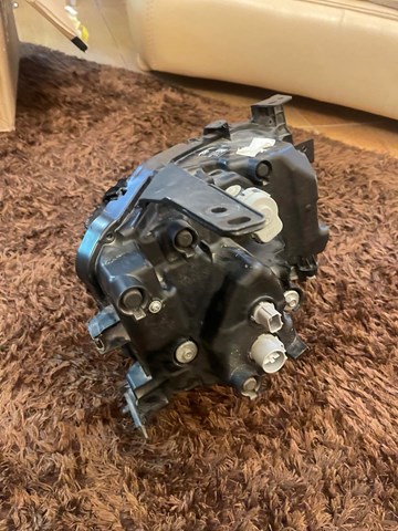 Купить DN4L51040 Mazda Фара левая передняя