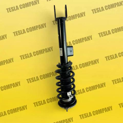 Амортизатор передний левый 104409000A Tesla