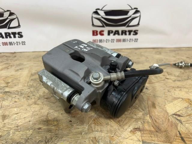 Суппорт задний левый D40106RA0A Nissan/Infiniti