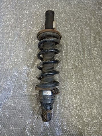 E61011LB7A Nissan/Infiniti Амортизатор передний левый