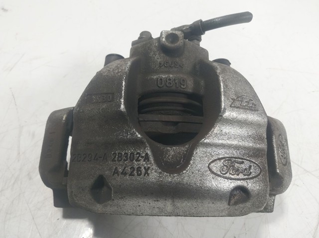 2500953 Ford Суппорт тормозной, передний, левый