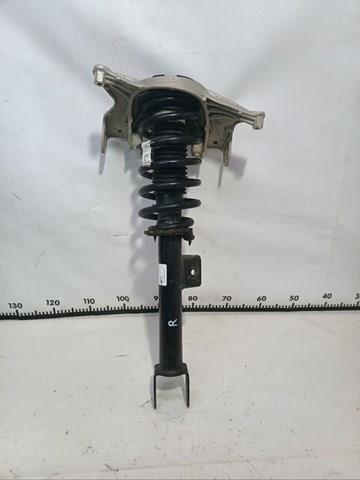 104436400G Tesla Амортизатор передний левый