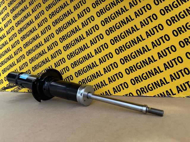 Стойка передняя левая Mazda KJK334900