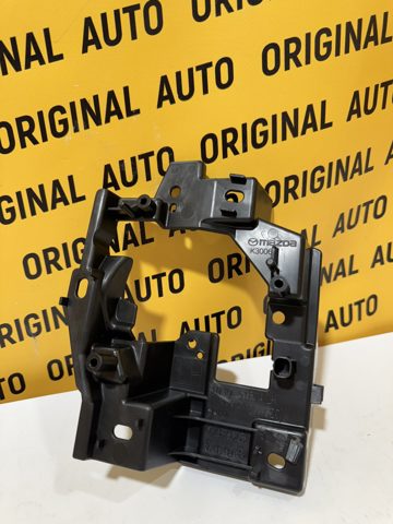 Кронштейн крепления противотуманной фары левой Mazda TN3951694A цена, от 13.48 USD