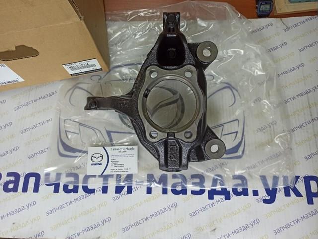 Купить TN3933021A Mazda Ось передняя и поворотные кулаки