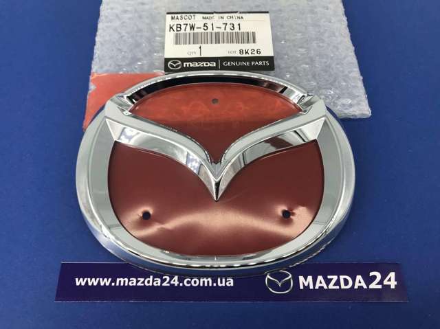 Купить KB7W51731 Mazda Эмблема крышки багажника