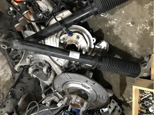 104446100E Tesla Амортизаторы задние