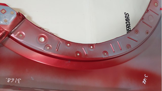 Крыло левое Mazda DGY952200