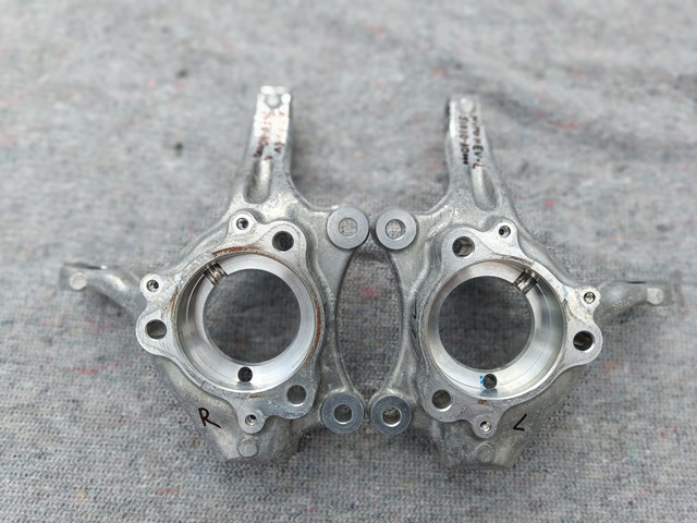 Купить 51710AO000 Hyundai/Kia Цапфа поворотная левая