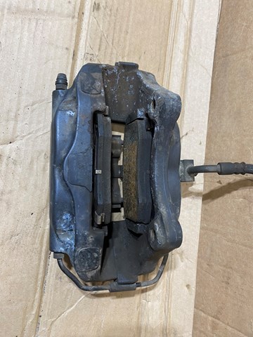 Задний правый суппорт Tesla 102764400A