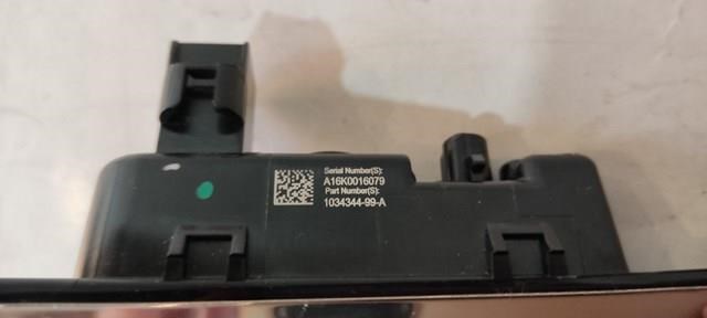  103434400B Tesla
