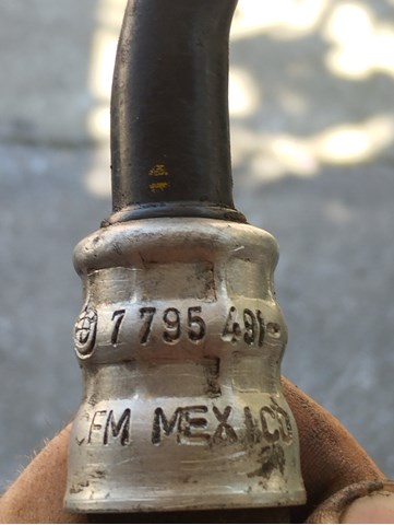7795491 BMW Обратка масляного радиатора, низкого давления